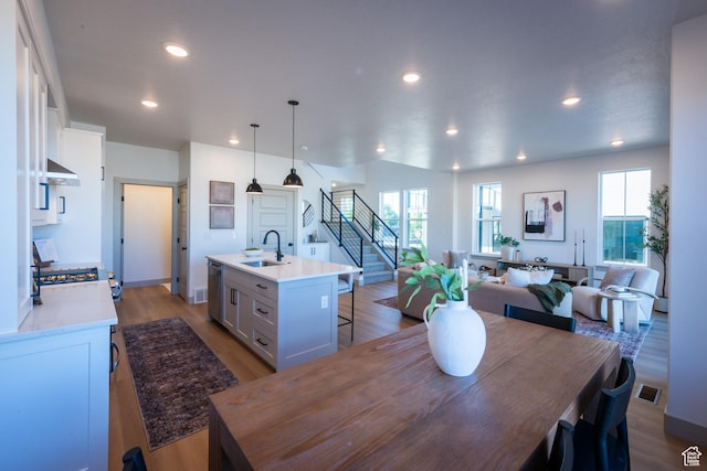 8093 S 615 E, Sandy, UT 84070 - dining space featuring stairway, plenty of natural light, recessed lighting, and visible vents