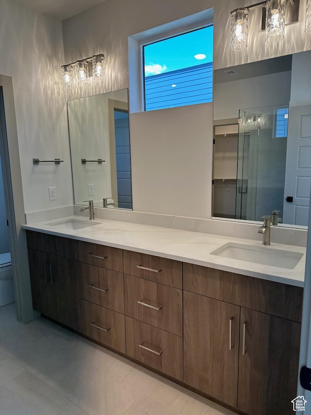 8093 S 615 E, Sandy, UT 84070 - full bath featuring double vanity, toilet, a shower stall, and a sink