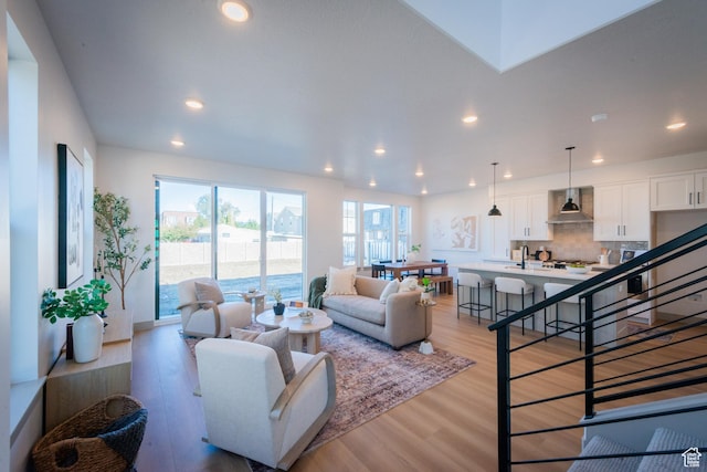 8093 S 615 E, Sandy, UT 84070 - living room with recessed lighting and light wood-style flooring