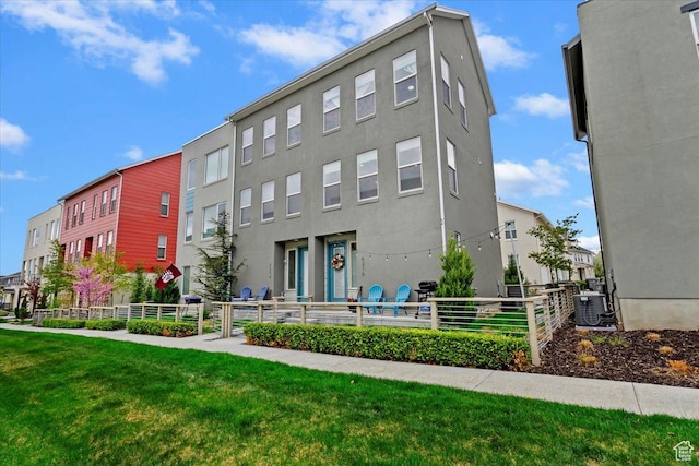 6216 W Birch Run Rd S, South Jordan, UT 84009 - view of building exterior featuring fence and central AC unit