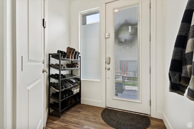 6216 W Birch Run Rd S, South Jordan, UT 84009 - doorway to outside featuring baseboards, plenty of natural light, and dark wood-type flooring