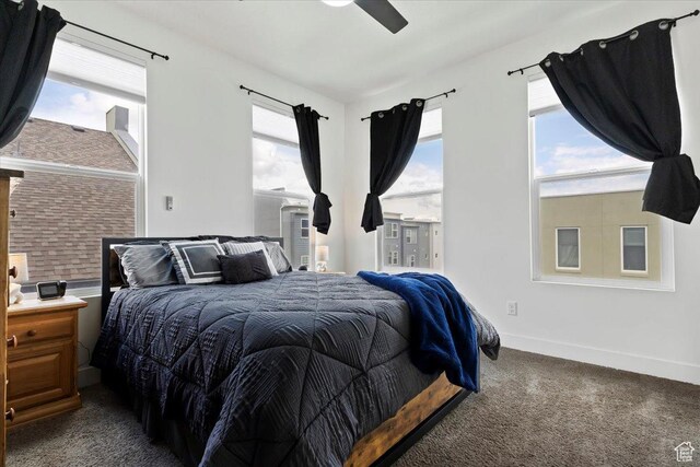 6216 W Birch Run Rd S, South Jordan, UT 84009 - bedroom featuring dark carpet, a ceiling fan, and baseboards