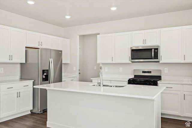3461 S 3100 W Unit 175, West Haven, UT 84401 - kitchen with appliances with stainless steel finishes, a sink, dark wood-style flooring, white cabinets, and recessed lighting