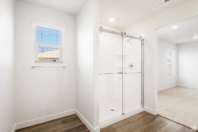 3461 S 3100 W Unit 175, West Haven, UT 84401 - bathroom featuring a stall shower, plenty of natural light, wood finished floors, baseboards, and recessed lighting