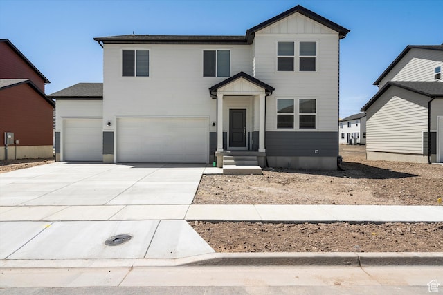 3461 S 3100 W Unit 175, West Haven, UT 84401 - view of front of home with concrete driveway, a garage, and board and batten siding
