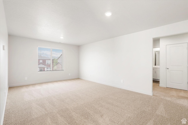 3461 S 3100 W Unit 175, West Haven, UT 84401 - empty room with light colored carpet, baseboards, and recessed lighting
