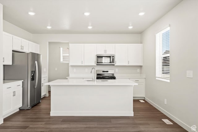 3461 S 3100 W Unit 175, West Haven, UT 84401 - kitchen with appliances with stainless steel finishes, a center island with sink, light countertops, a sink, and recessed lighting