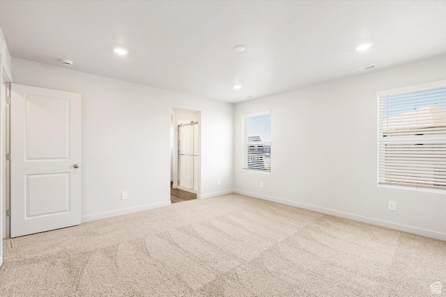3461 S 3100 W Unit 175, West Haven, UT 84401 - unfurnished bedroom featuring carpet, baseboards, multiple windows, and recessed lighting