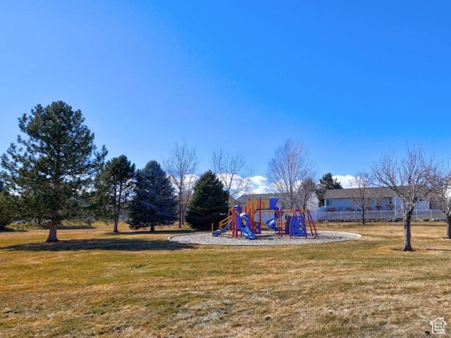 9745 S Tayside Dr W, South Jordan, UT 84009 - view of jungle gym featuring a lawn