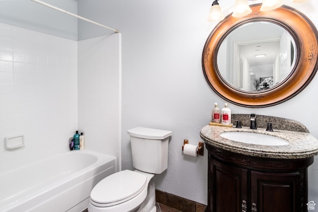 9745 S Tayside Dr W, South Jordan, UT 84009 - bathroom featuring toilet, vanity, bathing tub / shower combination, and baseboards