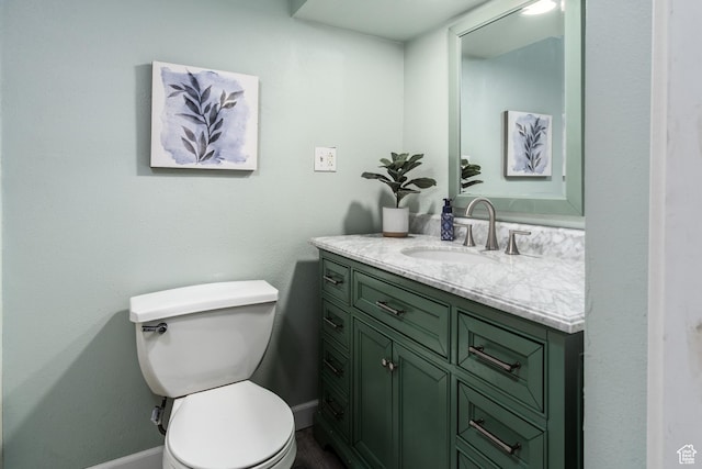 9745 S Tayside Dr W, South Jordan, UT 84009 - half bathroom featuring baseboards, vanity, and toilet