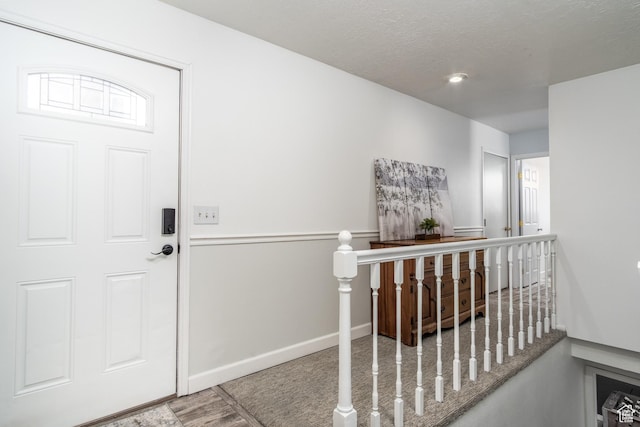 9745 S Tayside Dr W, South Jordan, UT 84009 - foyer with baseboards and wood finished floors