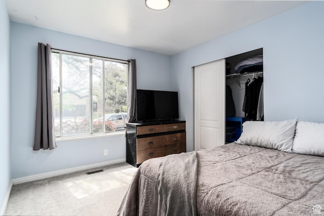 9745 S Tayside Dr W, South Jordan, UT 84009 - carpeted bedroom with multiple windows, baseboards, and a closet