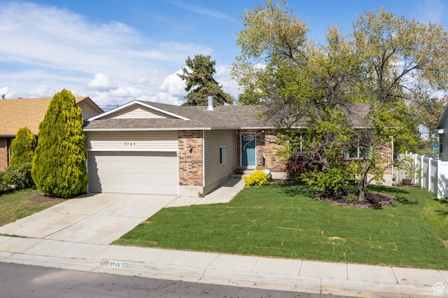 ranch-style house featuring fence, brick siding, a garage, a front yard, and concrete driveway
