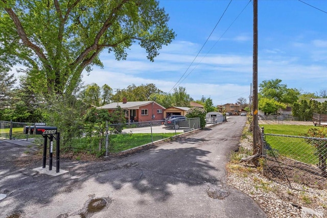 4612 S 600 E, Murray, UT 84107 - view of front facade featuring fence and a gate