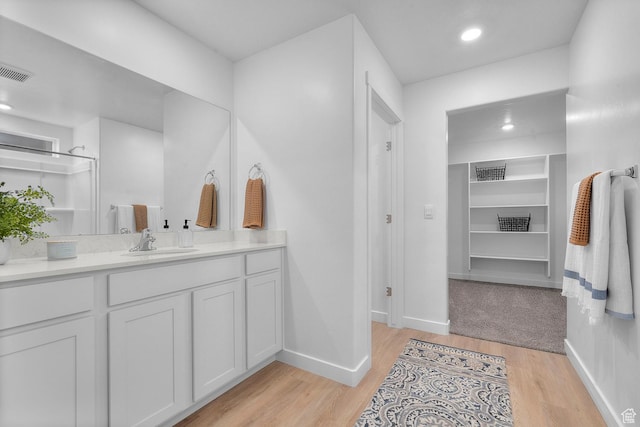 796 N 1860 E Unit 164, Salem, UT 84653 - bathroom with baseboards, visible vents, wood finished floors, and vanity