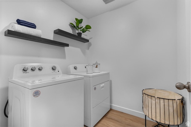 796 N 1860 E Unit 164, Salem, UT 84653 - laundry area featuring baseboards, separate washer and dryer, laundry area, and light wood-style flooring