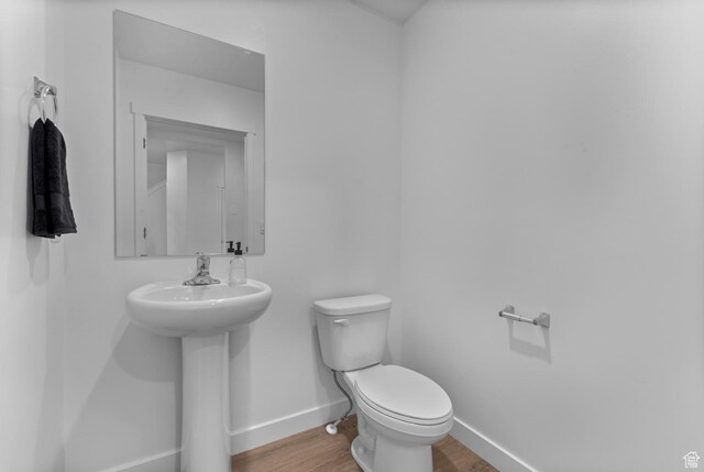 796 N 1860 E Unit 164, Salem, UT 84653 - bathroom with baseboards, a sink, wood finished floors, and toilet