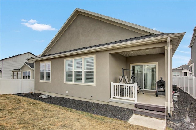 6264 W Antelope Flat Way S, Herriman, UT 84096 - back of house with fence, stucco siding, and cooling unit