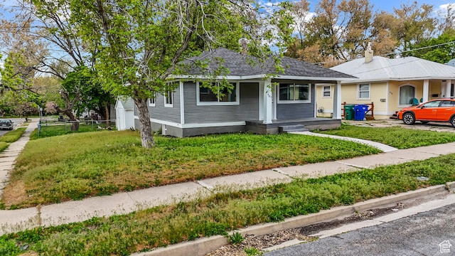 987 S Jefferson Ave E, Ogden, UT 84404 - view of front of property with covered porch and a front yard