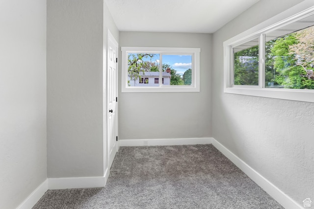 987 S Jefferson Ave E, Ogden, UT 84404 - carpeted spare room featuring baseboards