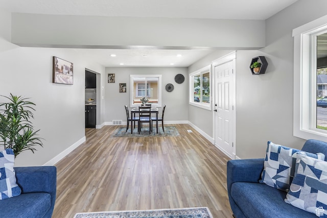 987 S Jefferson Ave E, Ogden, UT 84404 - interior space with baseboards, visible vents, a wealth of natural light, and light wood finished floors