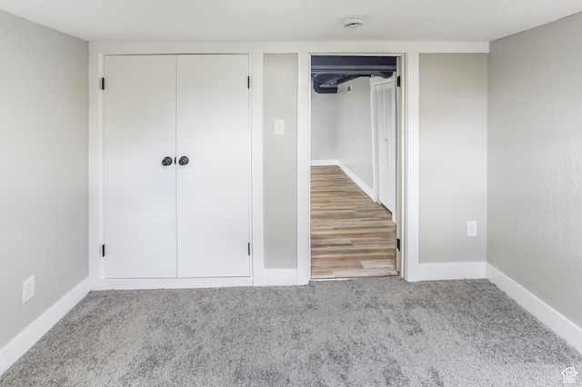 987 S Jefferson Ave E, Ogden, UT 84404 - unfurnished bedroom featuring baseboards, multiple closets, and carpet