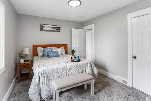 987 S Jefferson Ave E, Ogden, UT 84404 - carpeted bedroom with baseboards and visible vents