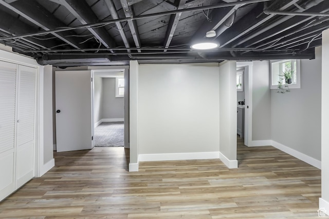 987 S Jefferson Ave E, Ogden, UT 84404 - basement featuring baseboards and light wood-style flooring