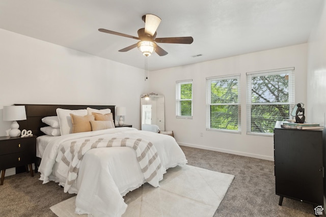 11572 S Harvest Rain Ave, South Jordan, UT 84009 - carpeted bedroom featuring baseboards and a ceiling fan