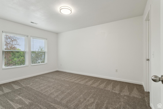 11572 S Harvest Rain Ave, South Jordan, UT 84009 - empty room with carpet floors and baseboards