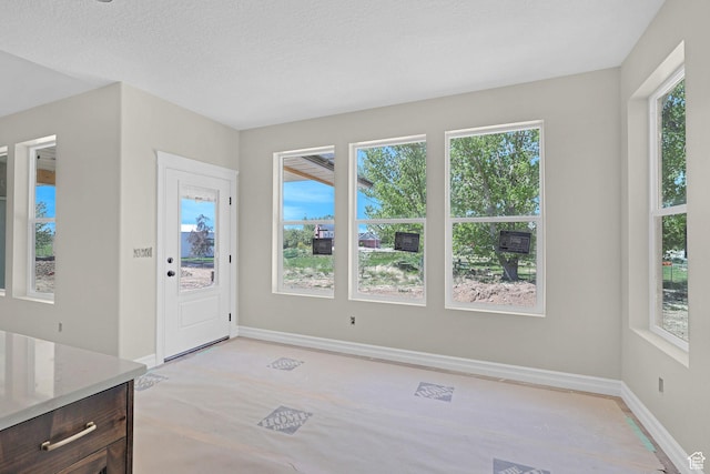 2881 N 3475 W Unit 17, Plain City, UT 84404 - foyer featuring baseboards