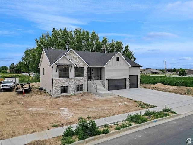 2881 N 3475 W Unit 17, Plain City, UT 84404 - modern inspired farmhouse with board and batten siding, driveway, and stone siding