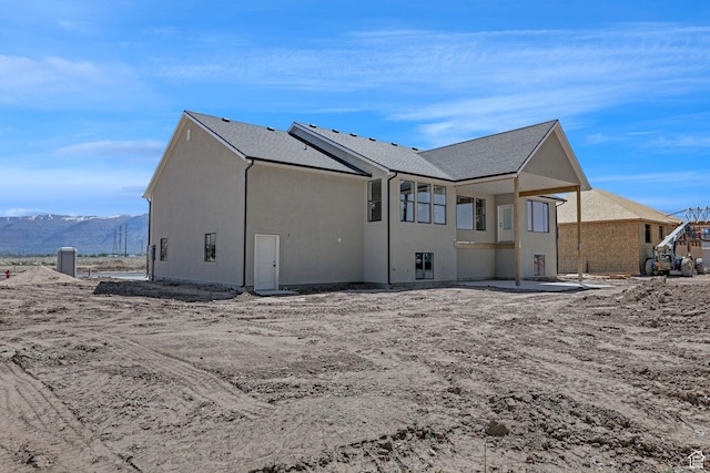 2881 N 3475 W Unit 17, Plain City, UT 84404 - back of property featuring a mountain view and stucco siding