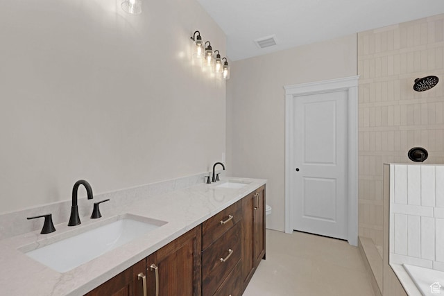 2881 N 3475 W Unit 17, Plain City, UT 84404 - bathroom featuring tiled shower, double vanity, and a tub