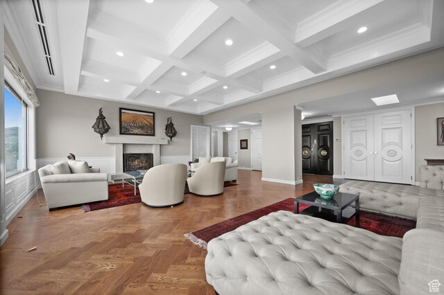 1235 E 200th St S Unit 1001, Salt Lake City, UT 84102 - living room featuring a warm lit fireplace, a wainscoted wall, recessed lighting, beamed ceiling, and coffered ceiling