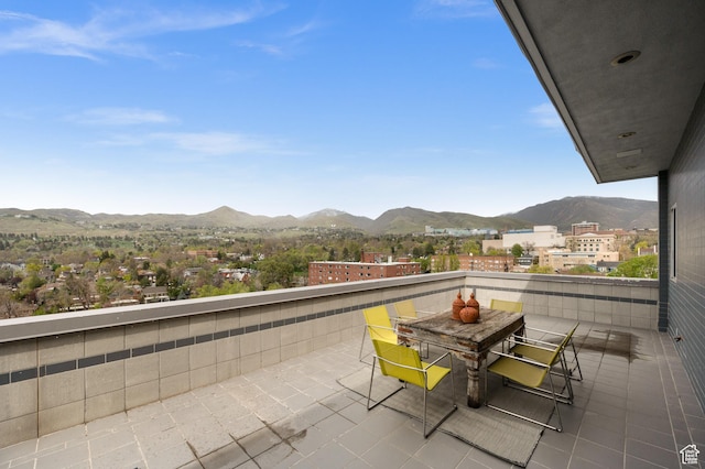 1235 E 200th St S Unit 1001, Salt Lake City, UT 84102 - balcony featuring outdoor dining area and a mountain view