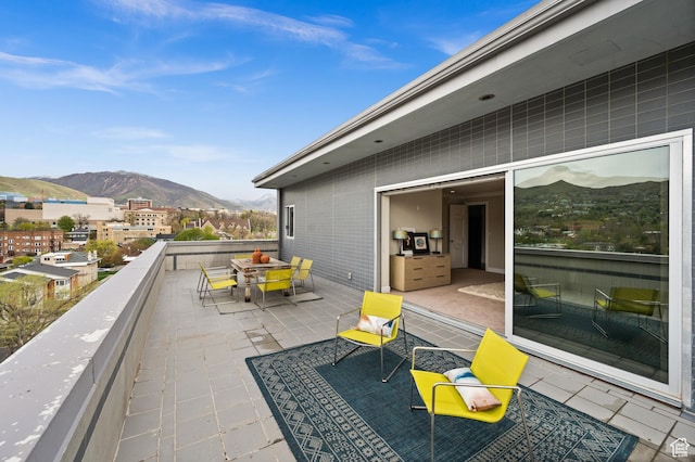 1235 E 200th St S Unit 1001, Salt Lake City, UT 84102 - view of patio with a mountain view and outdoor dining space