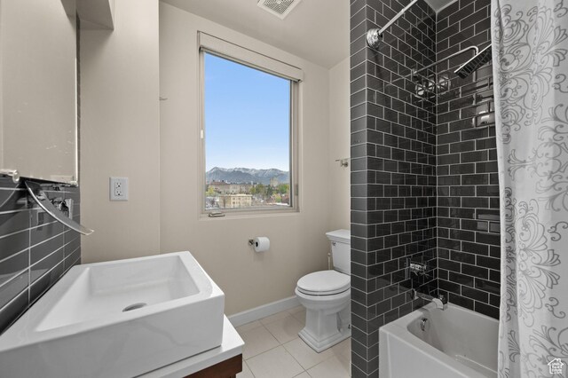 1235 E 200th St S Unit 1001, Salt Lake City, UT 84102 - bathroom with visible vents, tile patterned flooring, toilet, baseboards, and shower / washtub combination