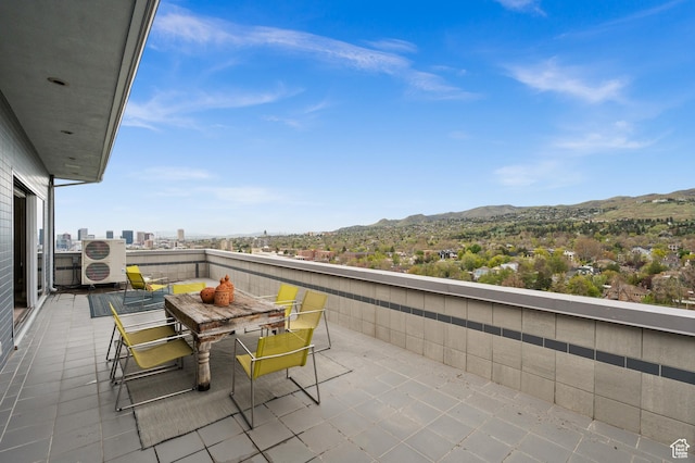 1235 E 200th St S Unit 1001, Salt Lake City, UT 84102 - balcony featuring a mountain view and outdoor dining area