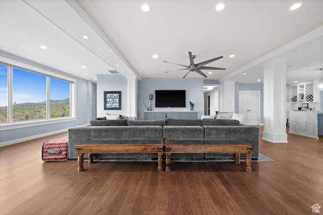 1235 E 200th St S Unit 1001, Salt Lake City, UT 84102 - living room featuring ornate columns, a ceiling fan, and wood finished floors