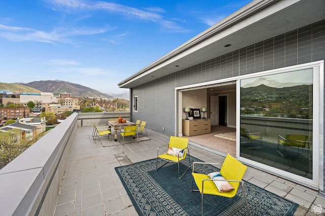 1235 E 200th St S Unit 1001, Salt Lake City, UT 84102 - balcony featuring outdoor dining area and a mountain view