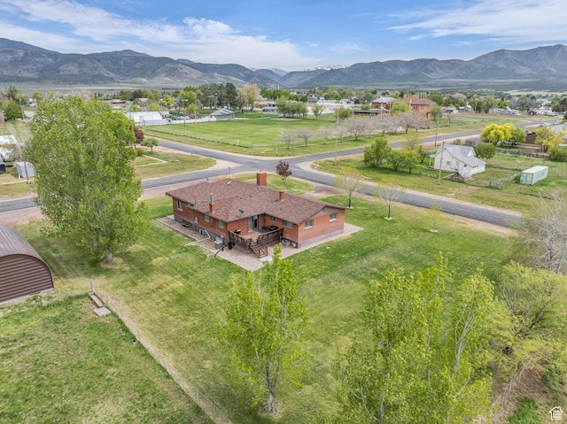 drone / aerial view featuring a mountain view