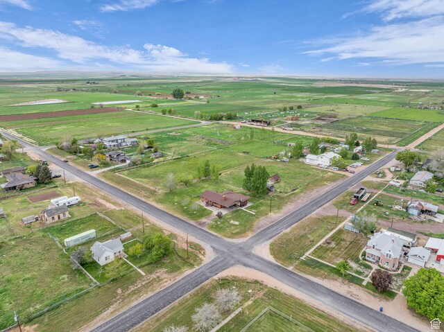 birds eye view of property featuring a rural view