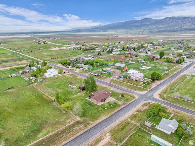 drone / aerial view with a rural view and a mountain view