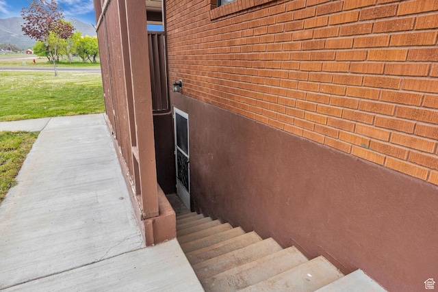 view of home's exterior with brick siding