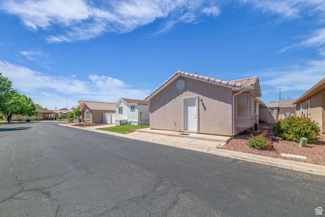 2990 E Riverside Dr Unit 118, St George, UT 84790 - view of front of property with stucco siding and a tile roof