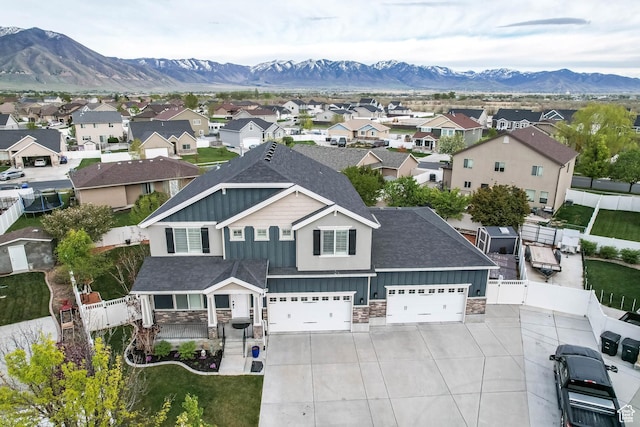 5764 Greenwich Cir, Stansbury Park, UT 84074 - aerial view featuring a residential view and a mountain view