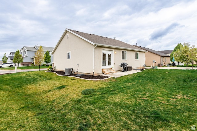 940 N 90 W, Santaquin, UT 84655 - back of property with a lawn, stucco siding, french doors, a patio area, and entry steps
