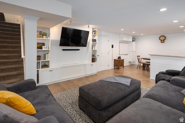 940 N 90 W, Santaquin, UT 84655 - living room featuring light wood finished floors, stairs, and recessed lighting